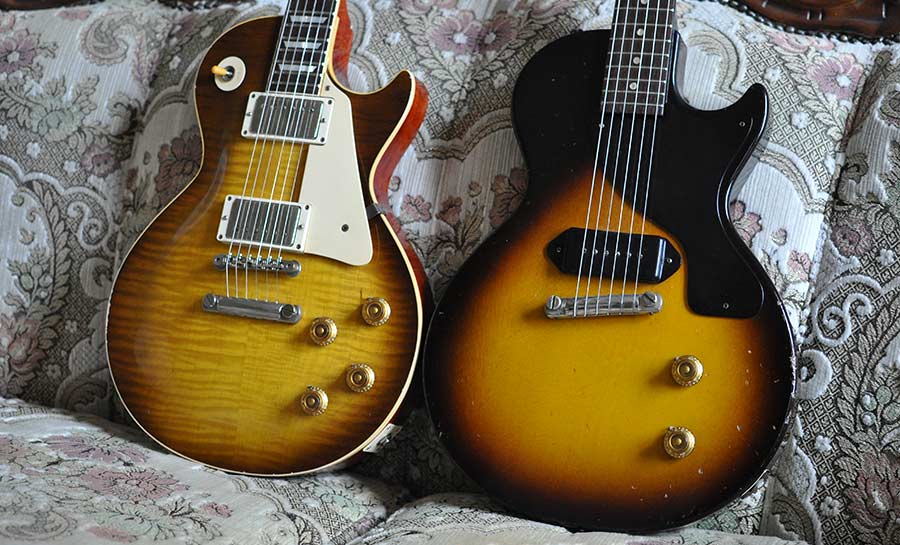 Les Paul copy next to a 1957 GIbson Les Paul Junior.